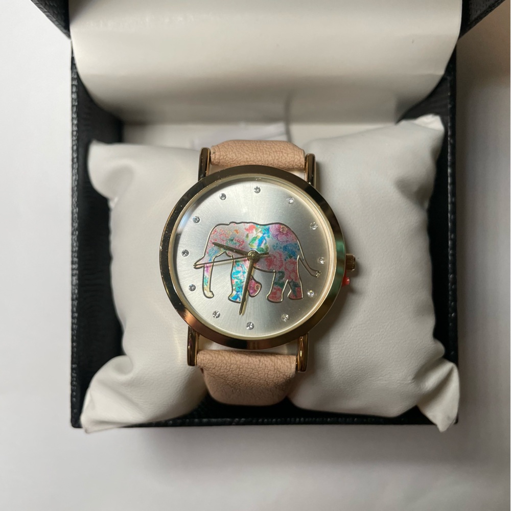 Elegant Gold Watch with Tan Strap
